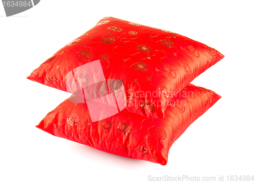 Image of two red decorative pillows