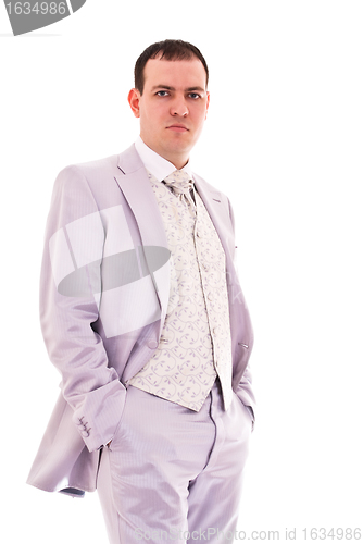 Image of attractive young man in wedding suit