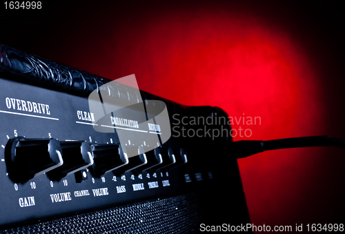 Image of combo amplifier on red background