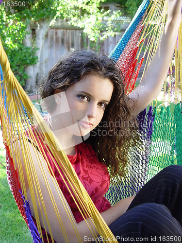 Image of Cute girl in a hammock