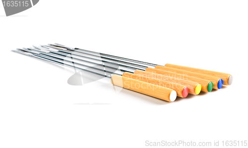 Image of colored fondue forks