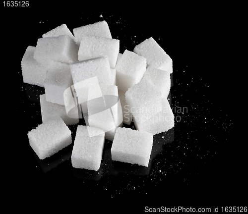 Image of pieces of sugar on black