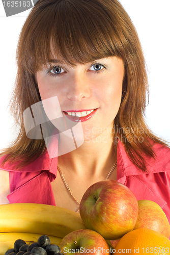 Image of smiling girl with dish of fruits