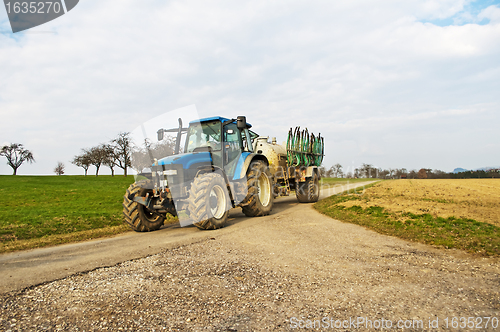 Image of tractor with dung