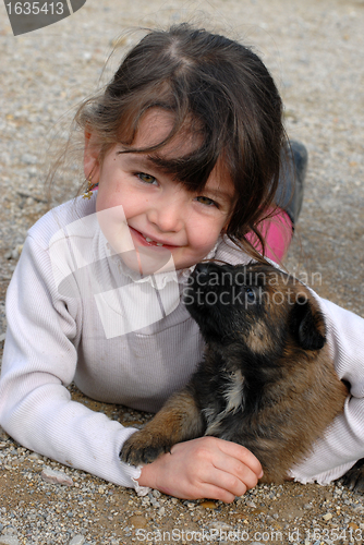 Image of girl and puppy