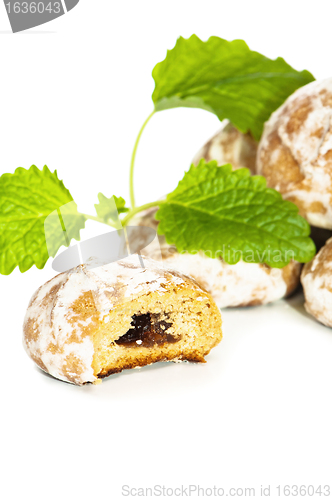 Image of gingerbread and Peppermint leaves, isolated on white