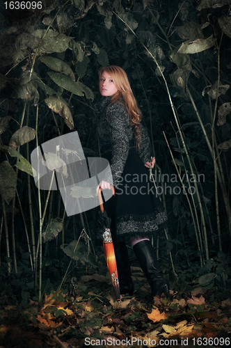 Image of girl running in enchanted forest