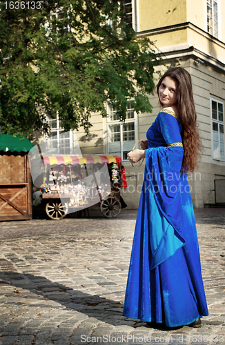 Image of medieval girl on street