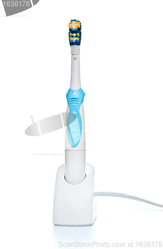 Image of electric toothbrush on stand