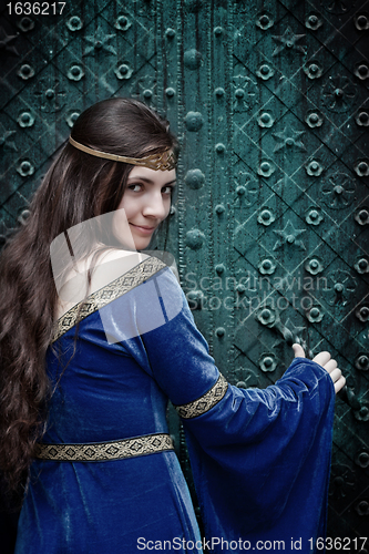Image of girl opening terrible door