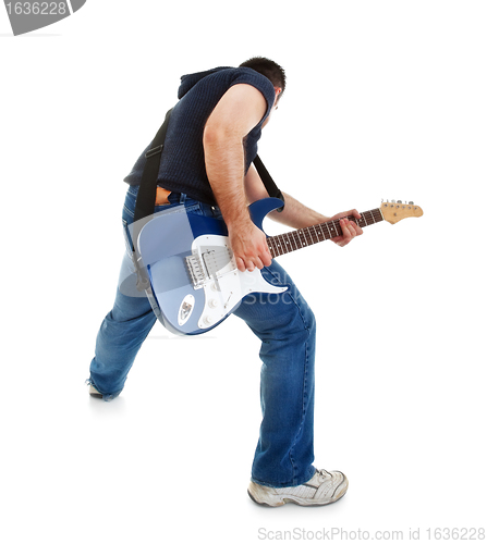 Image of rocker playing guitar