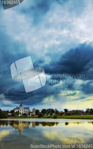 Image of monastery on lake at evening