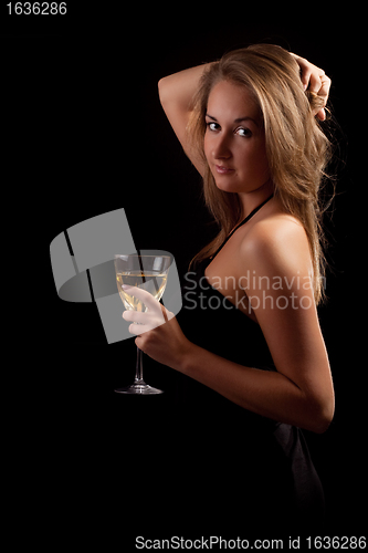 Image of beautiful girl with glass of wine