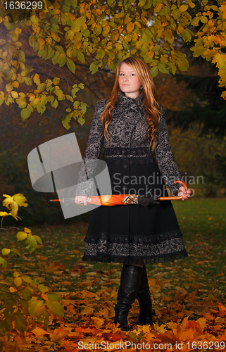 Image of girl in autumn forest