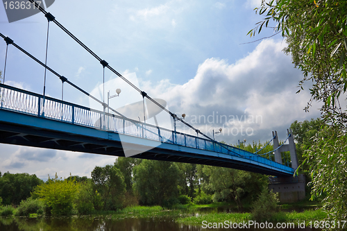 Image of metal bridge over the river
