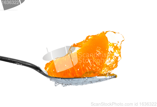 Image of mandarin in jelly on spoon