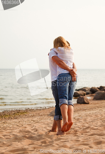 Image of couple fun on a beach
