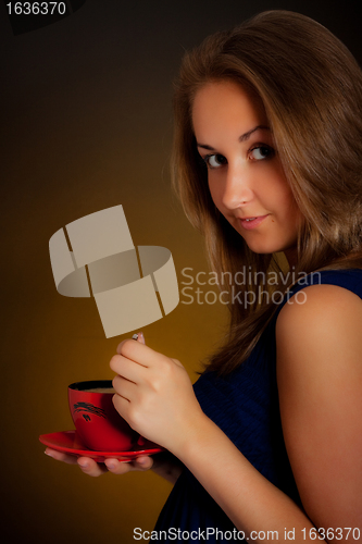 Image of beautiful girl with cup of coffee