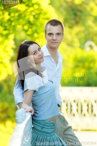 Image of young couple in summer park