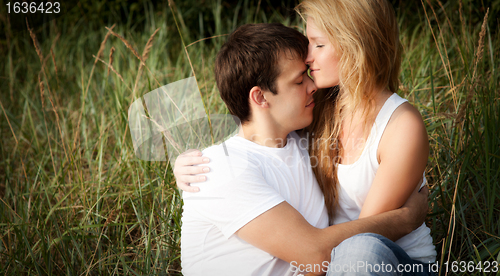 Image of young couple embrace