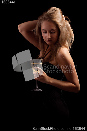Image of beautiful girl with glass of wine