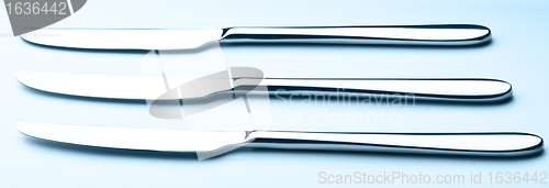 Image of three table knives