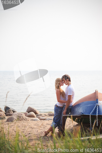 Image of beautiful couple on a beach