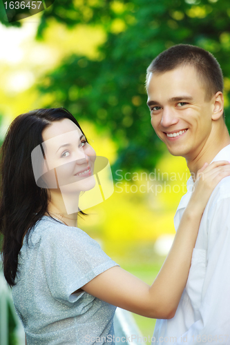 Image of young couple in summer park