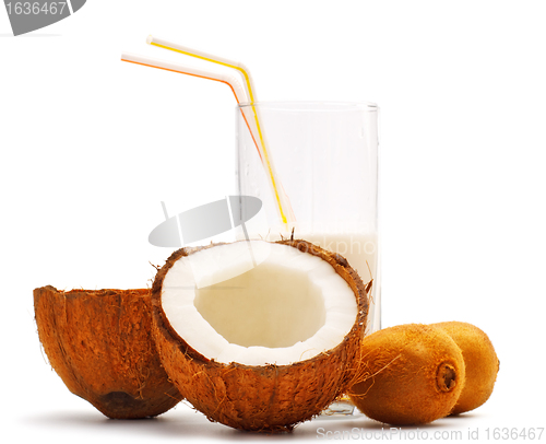 Image of coconut, kiwi and glass with coco milk