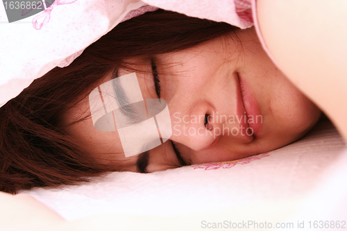 Image of Beautiful young woman sleeping.