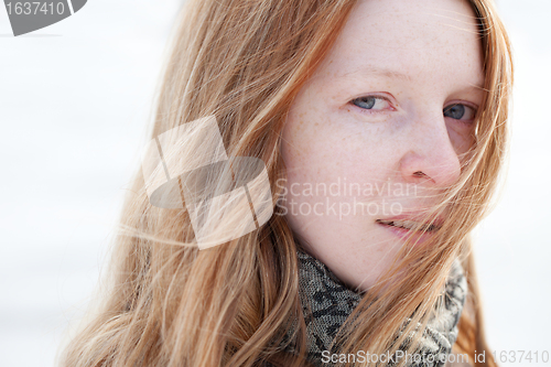 Image of blonde woman with wind