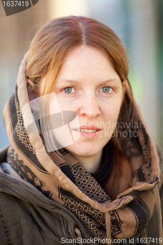 Image of a young red-haired woman