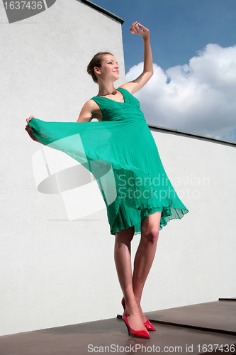 Image of girl in red loafer