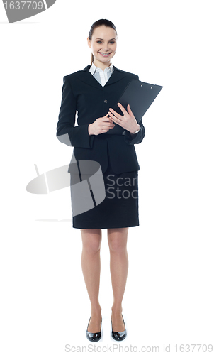 Image of Young businesswoman with a document folder