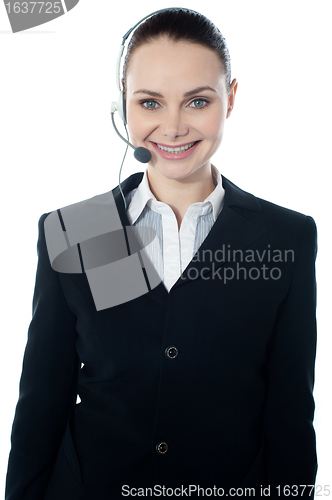 Image of Woman wearing headsets, could be receptionist