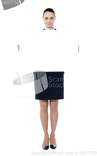 Image of Woman showing billboard banner