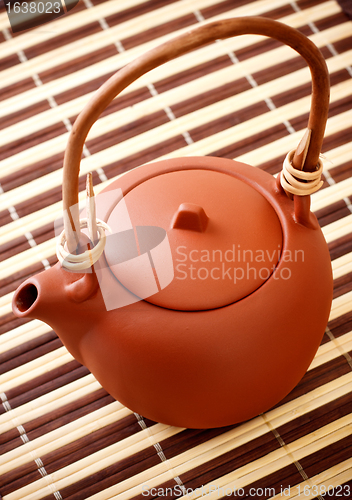 Image of brown clay kettle