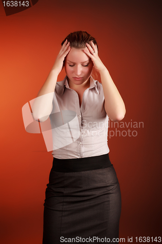 Image of beautiful woman headache