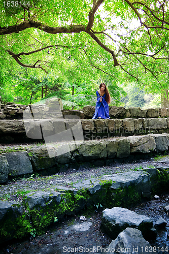 Image of elf princess on stone staircase