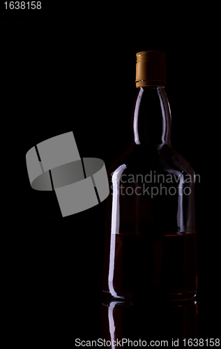 Image of Whiskey Bottle On Black