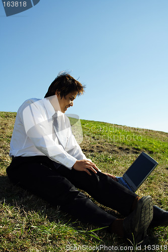 Image of Working businessman