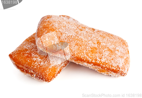 Image of two donuts in powdered sugar