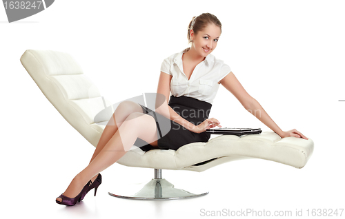 Image of Young Businesswoman With Laptop