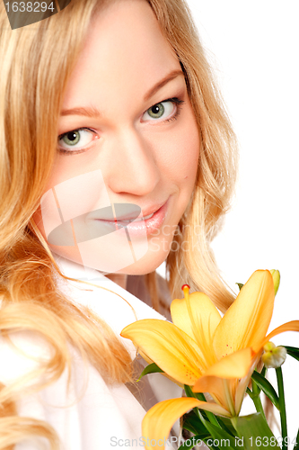 Image of Beautiful Young Woman With Lily Flower