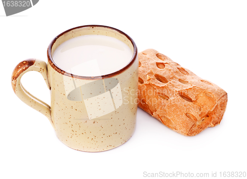Image of Crispy Bun and Mug of Milk