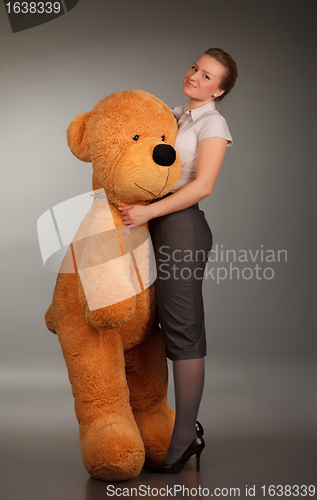 Image of girl with funny toy bear
