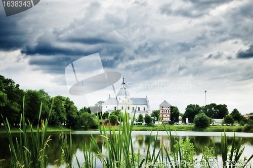 Image of monastery on lake at evening