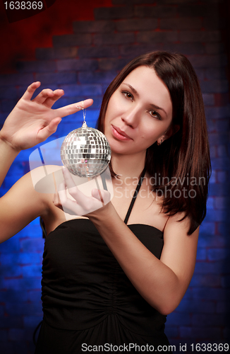 Image of girl with decoration ball