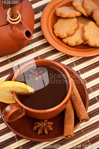 Image of tea with cinnamon sticks and star anise