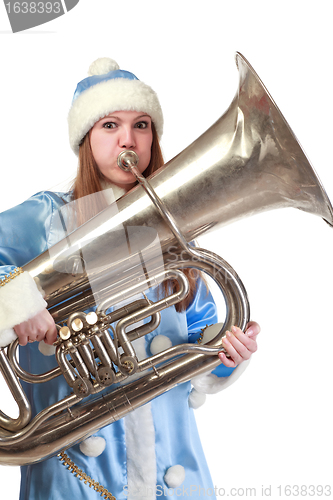 Image of funny santa girl playing trumpet